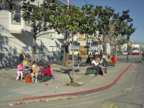 Curb extensions can provide usable neighborhood space for community gathering and socializing.